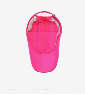 Detail view of the rose pink sports cap interior lining and breathable mesh structure