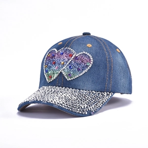 Blue denim baseball cap with glitter hearts and rhinestone-encrusted brim for women