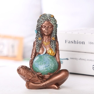 Bronze Gaia Earth Mother goddess figurine holding blue globe ornament for desktop