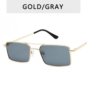 Detail van het gouden metalen frame en grijze glazen van deze retro zonnebril