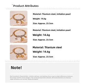 Close-up of golden stainless steel bracelet with seashell, starfish charms and pearls