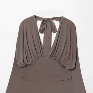 Fashionable dark taupe V-neck long sleeve puffy mini dress with pleated waist detailing