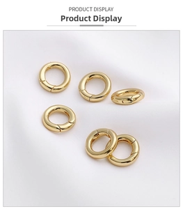 Macro view of 14k gold plated 13mm round spring clasps for DIY jewelry making