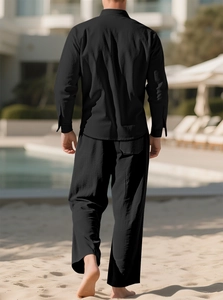 Rear view of black cotton linen shirt and trousers set with a relaxed vacation fit