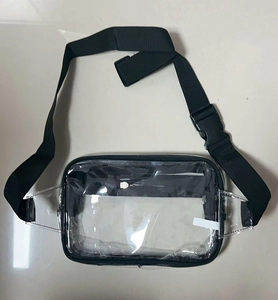 Top-down view of a clear PVC waist bag with black adjustable strap and buckle closure