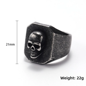 Detailed view of heavy vintage skull ring in distressed steel with 21mm height spec