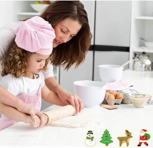 Detail of Christmas stainless steel cookie cutters set featuring snowman and reindeer