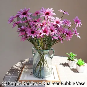 Artificial purple daisies set with light blue bubble glass vase for home decor