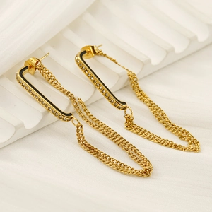 Vintage gold tassel earrings with U-shaped crystal studs and double layer chains