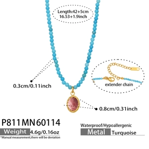 Detail of turquoise beaded necklace with pink pendant and gold extension chain