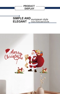 Minimalist Christmas wall stickers with Santa and Merry Christmas text on a white wall