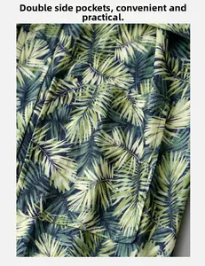 Detail showing tropical palm leaf print robe with practical side pocket functionality