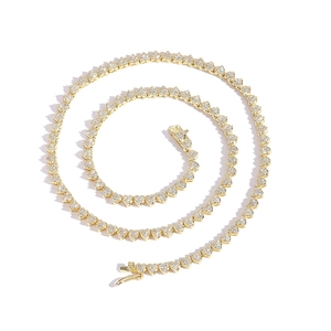 Golden tennis chain necklace with heart-shaped links and sparkling micro-pave zircons
