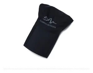 Folded view of the black quick-dry cap showing the portable design and logo