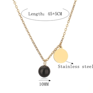 Detail of 10mm black stone pendant and gold stainless steel necklace with 45+5cm length