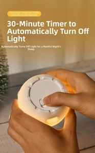Detail showing the bottom power switch and charging port of the snowman night light