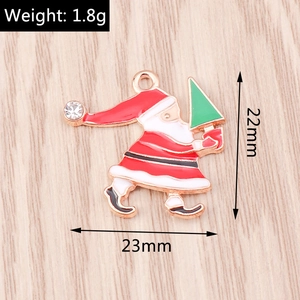 Détails du pendentif Père Noël avec dimensions 22mm x 23mm et poids de 1,8g indiqué