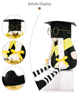 Detail view of graduation gnome featuring bachelor's cap, round glasses and braided hair
