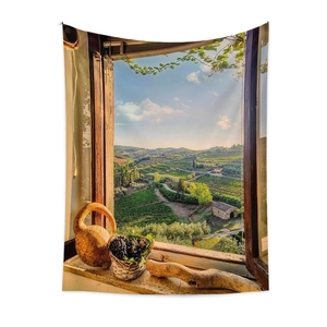 Detail of bohemian tapestry showing a serene vineyard landscape view through a wooden window