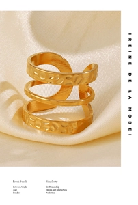 Detail of 18K gold plated multi-layer spiral ring with a unique hammered texture finish