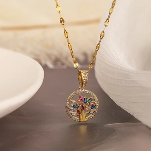 Gold plated Tree of Life necklace featuring colorful marquise gemstones and zircon accents