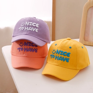 Kids baseball caps with smiley embroidery in purple, orange, and yellow cotton fabric