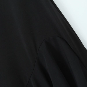 Slim fit black chiffon maxi dress with intricate mesh stitching and ruffled hem detail