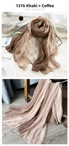 Detail view of khaki and coffee gradient silk scarf with pleated texture and stylish drapes