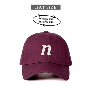 Detail of adjustable wine red baseball cap with white 'n' embroidery and hat size guide