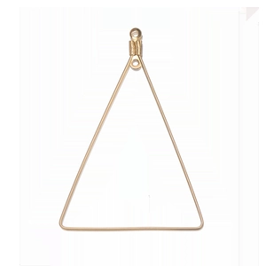 Detailed close-up of a polished gold-plated triangular pendant base for jewelry making