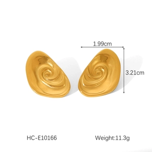 Detailed view of 18K gold titanium steel spiral conch earrings with size measurements