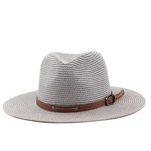 Close-up of light gray straw fedora with brown faux leather band and silver rivets