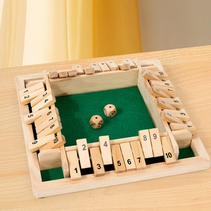 Classic wooden four-player Shut the Box board game with green felt and dice