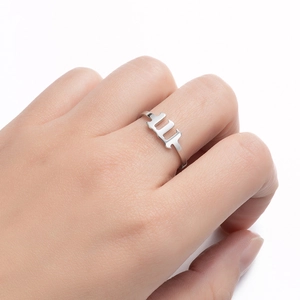 Close-up of number 111 angel ring in silver finish worn on finger for a stylish look