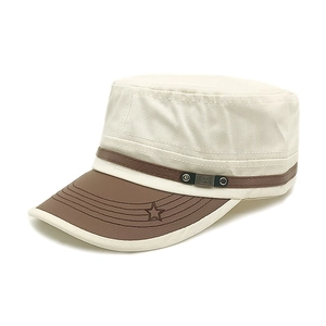 Detail of cotton cadet cap with faux leather brim, star embroidery, and metal accents