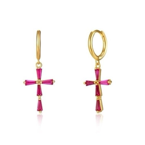 Close-up of gold hoop earrings featuring cross pendants with pink trapezoid-cut gems