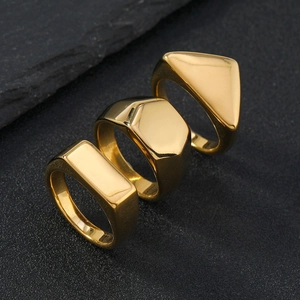 Polished gold geometric stainless steel ring set with rectangle, hexagon and triangle shapes