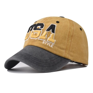 Detail of USA STYLE 3D embroidery on washed cotton baseball cap with yellow and grey contrast