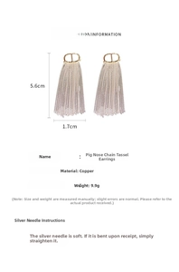 Detail view of pig nose tassel earrings showing 5.6cm height and 1.7cm width dimensions