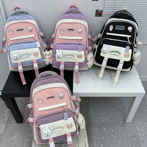 Multi-color cartoon school backpacks for students with cute hanging plush accessories