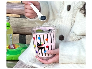 Pink portable salad cup with internal strainer and folding fork for fruit snacks