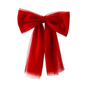 Large red sheer tulle bow decoration for Christmas trees and festive home scene setting