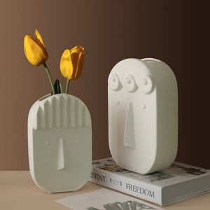 Minimalist white ceramic face vase set with creative Nordic artistic hair textures