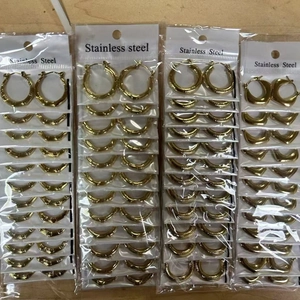Bulk packs of hammered gold stainless steel hoop earrings in various geometric styles