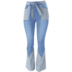 Detail view of high waisted patchwork flare jeans with tie belt and oversized pockets