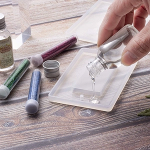 DIY resin switch panel mold kit with clear epoxy resin and colorful glitter powders