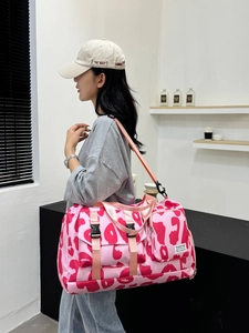 Pink leopard print sports gym bag with large capacity and adjustable shoulder strap
