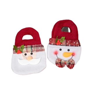 Christmas gift bags with 3D Santa and Snowman designs featuring plaid ribbon accents