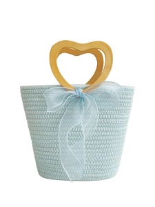 Sweet light blue woven cotton handbag featuring wooden heart handles and tulle bow detail