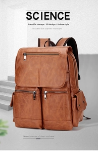 Detailed view of vintage brown PU leather backpack with multiple pockets and metal buckles